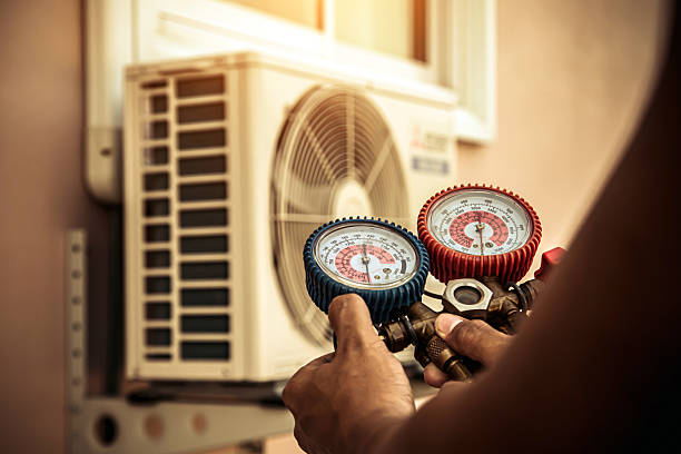 Professional Air Conditioning Service technician working in Berlin, CT